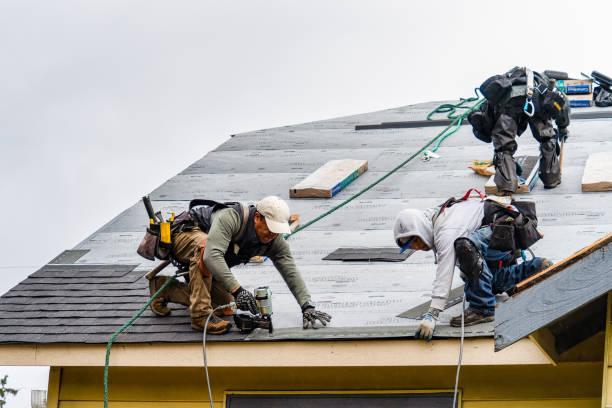 Professional Roofing technician working in Baltic, CT